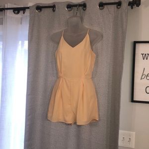 Cream colored shorts romper